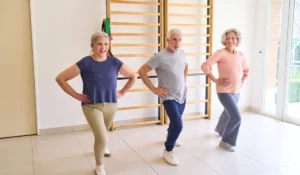 Senior adults performing Functional Range Systems balance training exercise improving stability joint control and fall prevention.